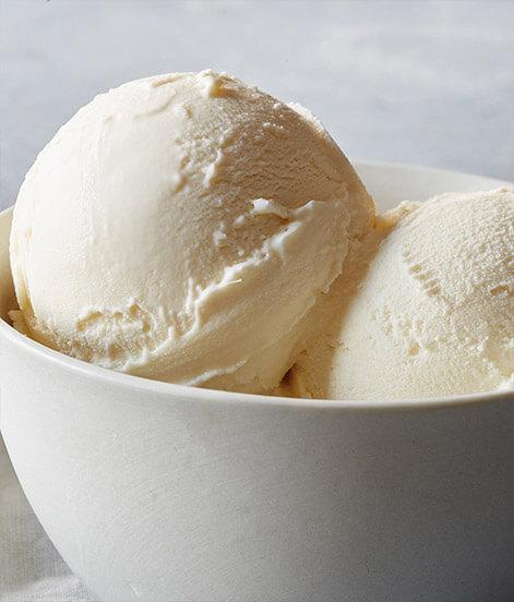 Vanilla Frozen Yogurt · Vanilla is the essence of elegance and sophistication. This marriage of pure, sweet cream and Madagascar vanilla creates the sweet scent of exotic spice and a distinctive taste that lingers on your tongue. 