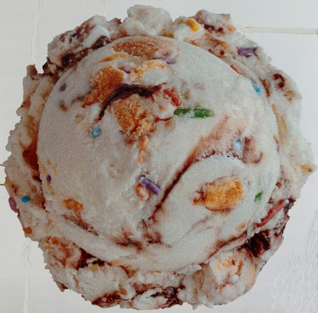 Birthday Cake Ice Cream - Regular · The limited edition ice cream flavor features vanilla cake batter ice cream with yellow cake pieces, a chocolaty brownie batter frosting swirl, and rainbow birthday sprinkles.
