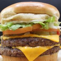 Prime Beef Burger · Double beef patty, double cheese, lettuce, pickles, tomatoes, onions, ketchup, mustard and m...