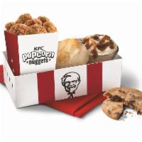 Popcorn Nuggets Meal · Includes Large Popcorn Nuggets, an individual side, a biscuit, and a cookie.