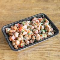 Fava Bean Salad · Fava beans, tomatoes, Italian parsley, lemon juice, garlic, and organic extra virgin olive o...