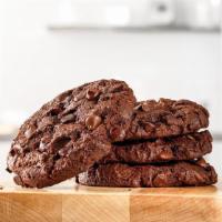 TRIPLE CHOCOLATE COOKIE · Warm and rich Triple Chocolate cookies baked with Ghirardelli chocolate. Just a little somet...