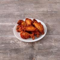 Chicken Wings · 6 PCs Cooked wing of a chicken coated in sauce or seasoning.
