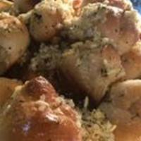 Garlic Knots · Bread, topped with garlic and olive oil or butter, herb seasoning, baked to perfection. Melt...