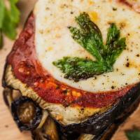 Campania Open Sandwich · Vegeterian. Eggplant parmigiana on a thick heritage wheat bread.