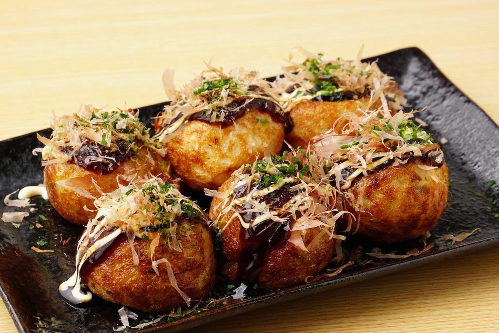 Takoyaki Octopus Balls 章鱼烧 · Batter made from octopus and shapped into a ball. 