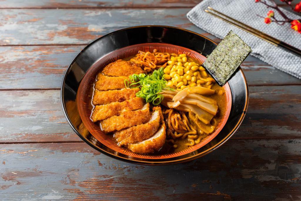 #7b Fried Pork Tonkatsu Curry Ramen · Fried Pork Tonkatsu,  1/2 marinated egg, bamboo shoots, corn, wakame, scallions and nori.