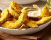 Avocado Fries · Fresh avocado slices tempura-battered and fried to order. Served with a side of creamy red c...