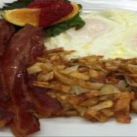 Big Country Breakfast · Two fresh eggs cooked any style, Country Fried Breakfast Potatoes, White -or- Wheat Toast an...