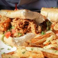 Oyster PoBoy · Seasoned Corn Flour dusted BBQ spiced Oyster’s on a French Roll with Lettuce, Tomato, Pickle...