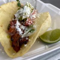 Puffy Steak Taco  · Marinaded Steak Grilled to Perfection!! Cotija cheese, guacamole, pico, sour cream, On a 6