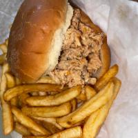 Turkey BBQ Sandwich · All natural chopped BBQ Sandwich served with one choice of side and slaw