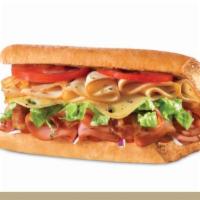 Honey Bacon Club · Turkey, ham, Swiss cheese, lettuce, tomatoes, onions and honey-French dressing.