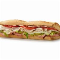 Spicy Monterey · Turkey, ham, provolone, pickles, lettuce, tomato, mayo and four-pepper chili sauce.