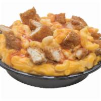 Mad and Cheese Bowl · Macaroni and cheese, chicken tenders, shredded cheese, and one sauce of choice.