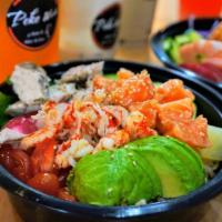 Poke Bowl with 2 Proteins · Extra toppings and extra protein for an additional charge.