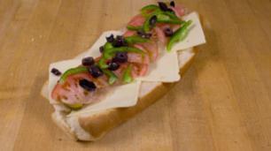 Veggie Italian Sub · vegetarion version of the original. Served with American cheese, onions, pickles, tomatoes, ...