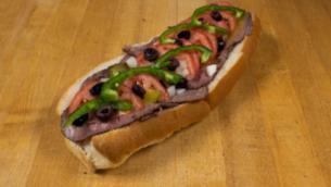 Roast Beef Italian Sub · Served with American cheese, onions, pickles, tomatoes, green peppers, olives, salt, pepper ...