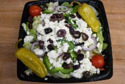 Greek Salad · Tomatoes, cucumber, onion, and olives.