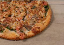 Grilled Chicken and Spinach Pizza · garlic, tomatoes, provolone + mozzarella