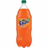 Fanta Orange 2L · Quench your thirst with this bright and bubbly orange soda! Caffeine free and made with 100%...