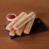 Breadsticks · 5 sticks and marinara dipping sauce, 1 dip. Long stick-shaped baked bread.