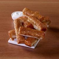 Cinnamon Sticks · Our freshly-baked cinnamon sticks are a sweet finale to pizza night. Don't forget the icing ...