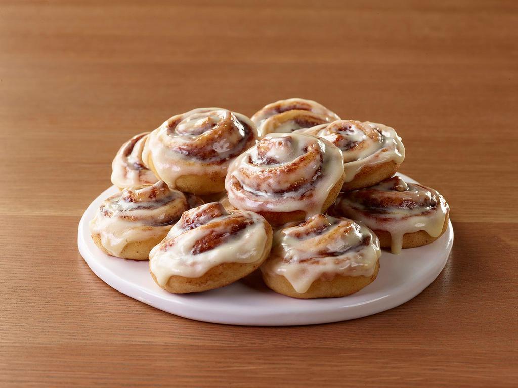 10 Piece Cinnabon Mini Rolls · 10 mini cinnamon rolls, topped with signature cream cheese frosting, are the perfect way to end pizza night. Or you can eat 'em first. Don't worry, we won't tell.