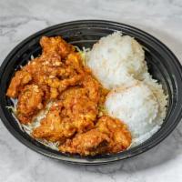 Korean Garlic Chicken Regular · 2 scoops rice Chicken battered and Fried dipped in garlic house sauce 