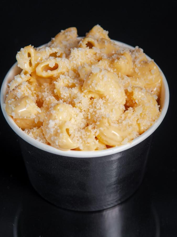 Sam's Mac n' Cheese · Macaroni in a 3 cheese blended sauce, topped with Parmesan.
