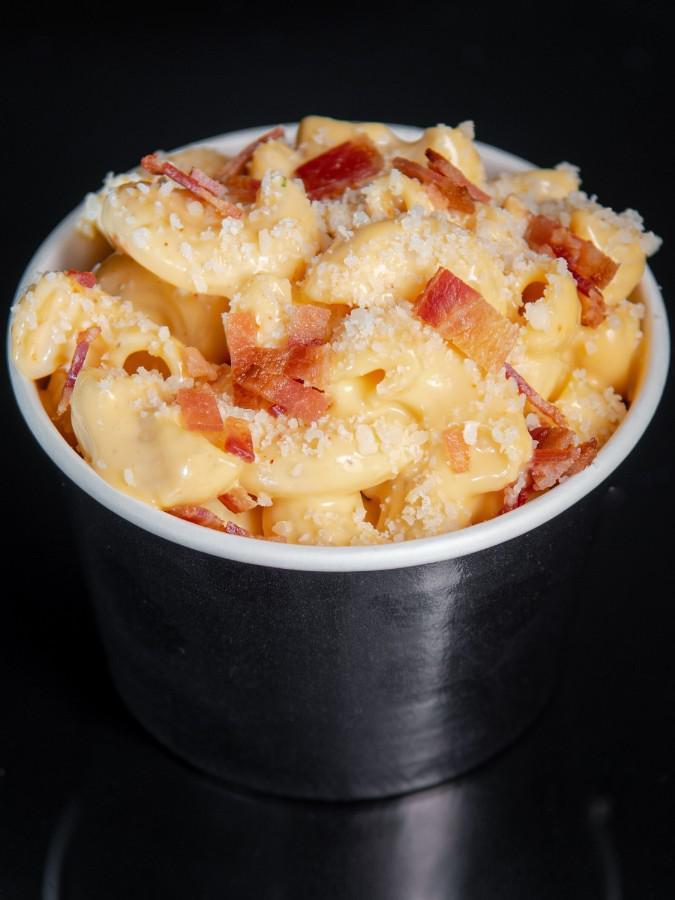 Sam's Bacon Mac n' Cheese · Macaroni in a 3 cheese blended sauce, topped with parmesan and bacon crumbles.