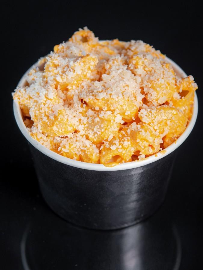 Sam's Buffalo Mac n' Cheese · Macaroni in a 3 cheese blend sauce, topped with parmesan and our spicy buffalo sauce.