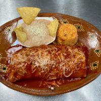 13. Wet Burrito Combo Plater · Recommended. Choice of asada, carnitas, pastor,  ground beef, chicken, topped with our delic...