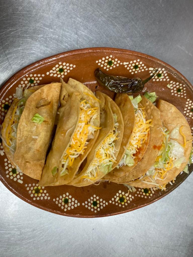 Hard Shell Crunchy Tacos · Choice of shredded chicken, or delicious ground beef, topped with lettuce and cheese.