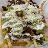 Super Fries · Your choice of meat loaded with beans, cheese, guacamole, pico de gallo, and sour cream.