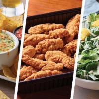 Chicken Tenders Family Bundle ¥ - Serves 6 · Includes: 
- Spinach & Artichoke Dip
- Chicken Tenders w/Honey Mustard
- Sides: Caesar Sa...