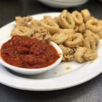 Crispy Fried Calamari · Serves 2. Served with spicy marinara.