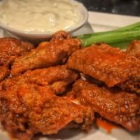 Chicken Wings · Buffalo, BBQ, sweet and sour, bourbon or sweet chili sauce.