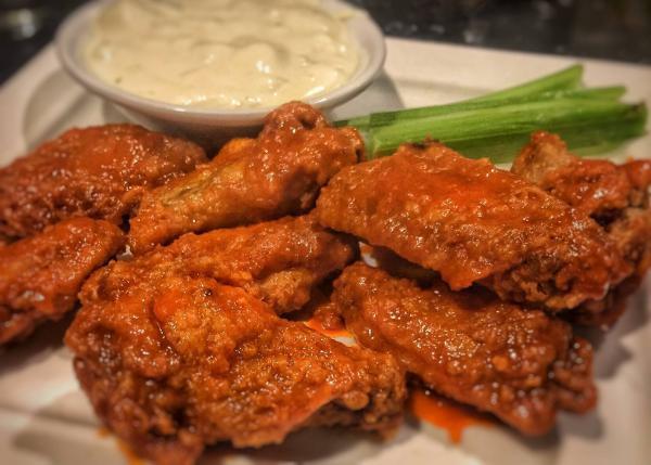 Chicken Wings · Buffalo, BBQ, sweet and sour, bourbon or sweet chili sauce.