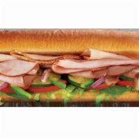 SUBWAY Club® Sandwich · Tender sliced turkey breast, lean roast beef and tasty Black Forest ham come together with y...