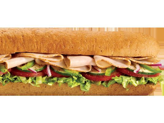 Turkey Breast Sandwich · Dive into tender turkey breast piled sky-high with everything from lettuce and tomatoes to green peppers, maybe even onions if you’re feeling spicy.