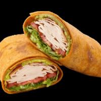 Turkey, Bacon & Guacamole Signature Wrap · The name says it all. A delicious Tomato Basil wrap filled with a double portion of turkey b...
