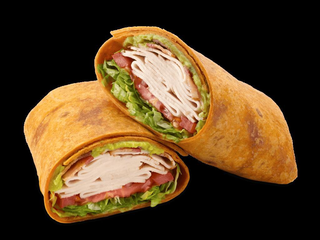 Turkey, Bacon & Guacamole Signature Wrap · The name says it all. A delicious Tomato Basil wrap filled with a double portion of turkey breast and smoky applewood bacon topped with Provolone cheese, guacamole, lettuce, tomatoes, red onions, and Ranch.