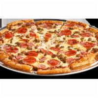 Giant Meat Eater Pizza  · Traditional crust brushed with garlic butter and topped with tomato sauce, 100% real cheese,...