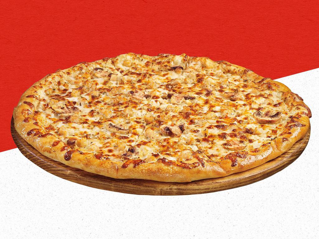 Classic Chicken Pizza · Zesty ranch sauce, 100% real cheese, chicken, mushrooms, and parmesan oregano seasoning.