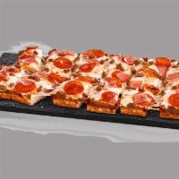 Meat Eater Pan Pizza   · Crispy, golden, pan-baked crust topped with tomato sauce, 100% real cheese, pepperoni, ham, ...