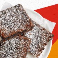 Brownies · 24 rich, fudgy chocolate brownies dusted with powdered sugar.