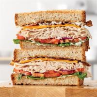 Roast Turkey Ranch & Bacon Sandwich · Premium sliced turkey breast with pepper bacon, Cheddar cheese, green leaf lettuce, tomato, ...