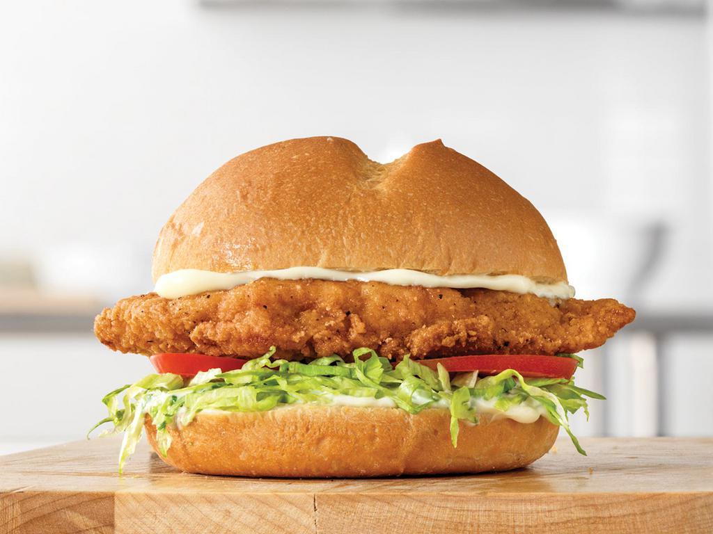 Crispy Chicken Sandwich · A crispy buttermilk chicken fillet with lettuce, tomato and mayo on a star top bun. Visit arbys.com for nutritional and allergen information.
