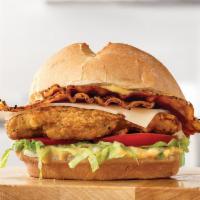 Crispy Chicken Bacon Swiss Sandwich · Chicken breast fried to perfection and topped with thick cut pepper bacon, Swiss Cheese, let...